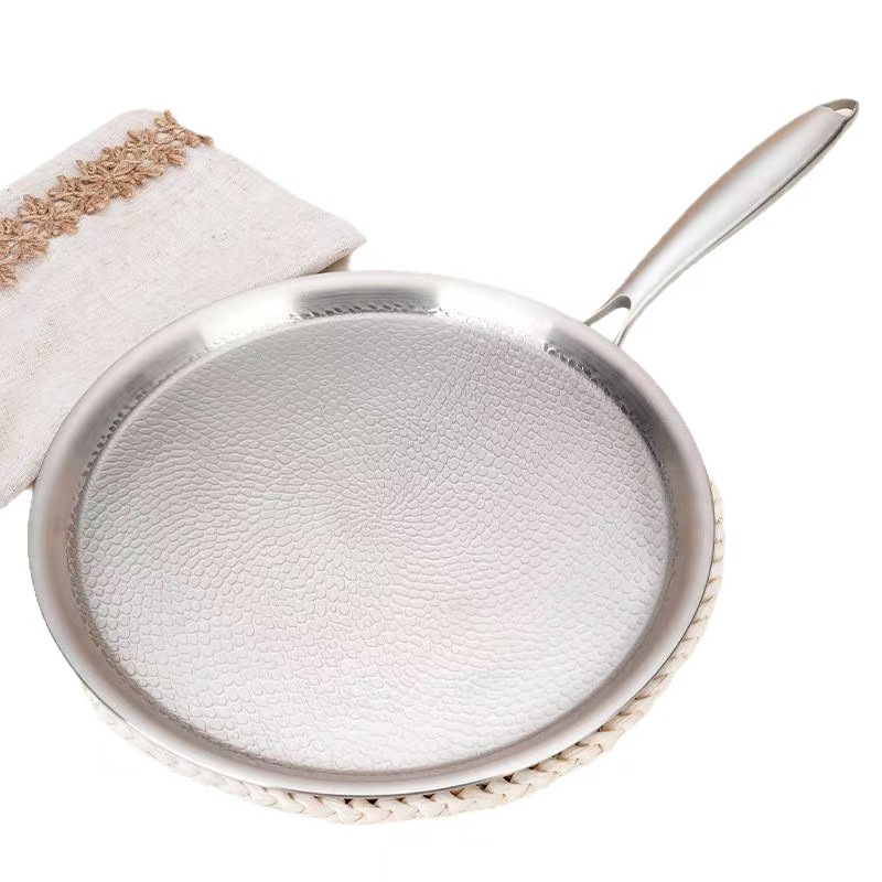 Tri-ply steel skillet